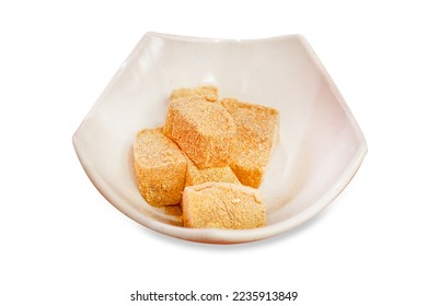 Die cut of Delectable Warabimochi, Soft and Chewy Japanese dessert on white isolated. - Shutterstock ID 2235913849