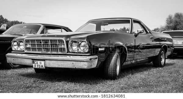 DIEDERSDORF, GERMANY - AUGUST 30, 2020: The\
coupe utility car Ford Ranchero 500, 1973. Black and white. The\
exhibition of \