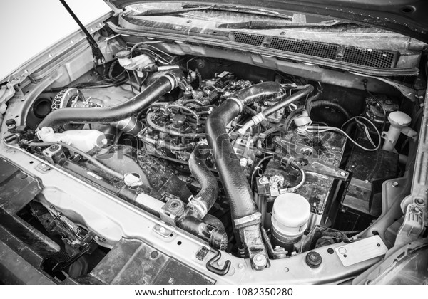 Diesel\
engine 2.5 litre under the hood of pickup\
truck