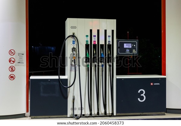 Diesel and gasoline pumps. Gas station for\
transport. Background with copy space for text or inscriptions.\
July 25, 2021 Beltsy\
Moldova.
