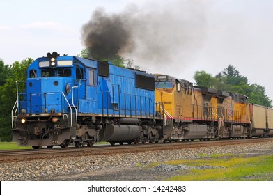 Diesel Locomotive Spewing A Cloud Of Smoke