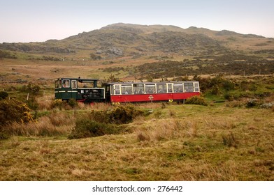 Diesel Train On The Snowdon Mountain Railway During A Wet Day