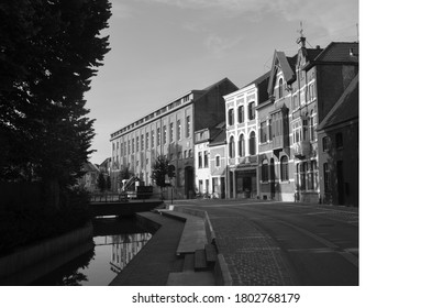 Diest, Belgium April 12 2020: Street called Demerstraat at the water in Diest with beautiful old and historical buildings. Image by Raphaëlla Goyvaerts