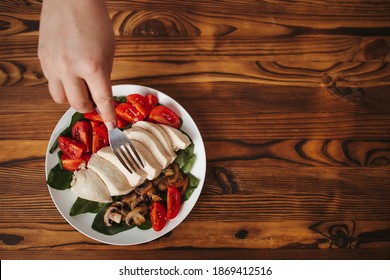 Diet Concept, Healthy Lifestyle, Low Calorie Food, Low Carb Diet. Fat Woman Eating Baked Chicken Breasts With Salad, Close Up