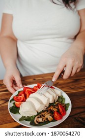 Diet Concept, Healthy Lifestyle, Low Calorie Food, Low Carb Diet. Fat Woman Eating Baked Chicken Breasts With Salad, Close Up