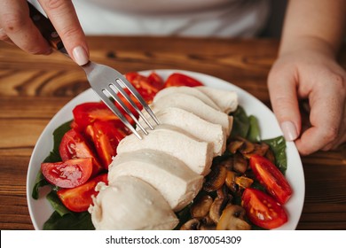 Diet Concept, Healthy Lifestyle, Low Calorie Food, Low Carb Diet. Fat Woman Eating Baked Chicken Breasts With Salad, Close Up