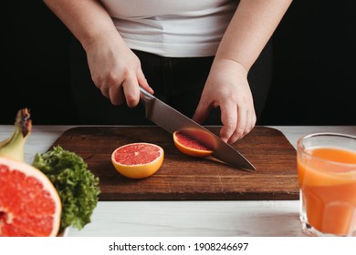 Diet Concept, Healthy Lifestyle, Low Calorie Food. Overweight Woman Cooking Healthy Dinner Of Fresh Juicy Fruits