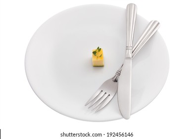 Diet Concept With Small Food On Plate On White Background