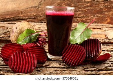 Diet Concept-Delicious Beet Smoothie Juice Served On A Wooden Backdrop.