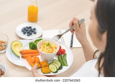 Diet, Dieting Asian Young Woman, Girl Hand Using Fork Eating Egg Salad In A Bowl With Mix Vegetables In Plate, Eat Keto Food Is Low Fat Good Health. Nutritionist Female, Weight Loss For Healthy Person