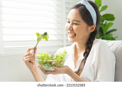 Diet, Dieting Pretty Attractive Asian Young Woman, Girl Use Fork At Lettuce On Mix Vegetables, Green Salad Bowl, Eat Food Is Low Fat To Good Body. Nutritionist Female, Weight Loss For Healthy Person.