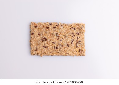 Diet Flax Seed Whole Grain Cracker Isolated On White Background, Soft Light, Top View, Copy Space