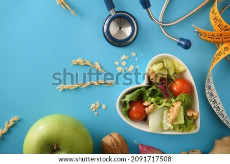 Diet food for health with heart bowl and stetoscope detail