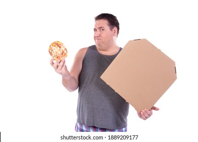 Diet and funny fat man. The fat guy is eating a small pizza. White background.