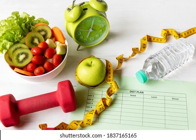 Diet Health Plan. Workout Planing For Stay At Home. Sport Exercise Equipment Workout AndÂ gym Background With Nutrition Fresh Salad For Fitness Style. Healthy Lifestyle Concept