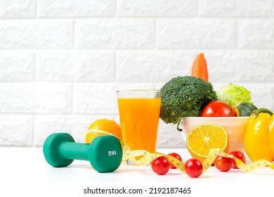 Diet And Healthy Fresh Vegetable Fruits For Detox Body Slim Fit For Health Lifestyle With Sport Exercise Equipment Workout And Orange Juice,  White Background. Weight Loss Diet Concept