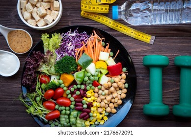 Diet And Healthy Life Loss Weight Exercise Concept. Fresh Vegetable Salad With Weight Scale Measure Prevention For Women Diet Slimming. Lifestyle Time And Healthy	