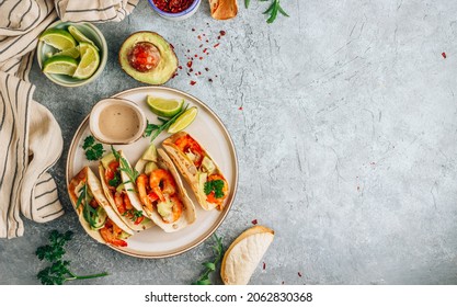 Diet Healthy Tacos With Shrimps And Avocado On Stone Background. Top View