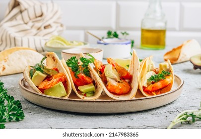 Diet Healthy Tacos With Shrimps And Avocado On Stone Background. Selective Focus