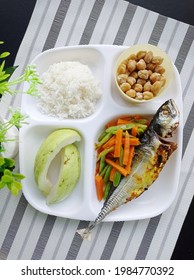 Diet Menu For Lunch With Grilled Fish , Some Stirfry Vegetable, Slice Of Guava And Steamed Chickpeas For Snacking A