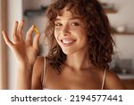 Diet. Nutrition. Healthy Eating, Lifestyle. Close Up Of Happy Smiling Woman Taking Pill With Cod Liver Oil Omega-3 In Morning. Vitamin D, E, A Fish Oil Capsules 