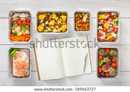 Diet plan mockup with healthy restaurant food delivery. Natural organic fitness nutrition for diet. Daily meals in foil boxes with copy space at white wood. Top view, flat lay