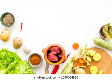 Diet vegetarian vegan food. Ratatouille or vegetable ragout. White table background top view mockup