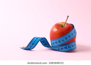 Diet and weight loss, healthy lifestyle, composition with measuring tape - Powered by Shutterstock