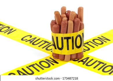 Dietary Fast Food Warning, Caution Of High Cholesterol And Saturated Fat, Unhealthy Nutrition Concept Image (Variety Of Beef Sausages, Wieners And Hot Dogs Wrapped In Yellow Caution Tape)