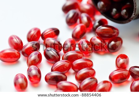 Dietary Supplements. The close-up of a supplement. Spreading beta carotene.