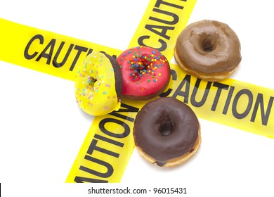 Dietary Warning, Or High Calorie/high, Fat Junk Food Warning (Donuts With Yellow Caution Tape)