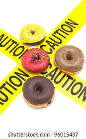 Dietary Warning, Or High Calorie/high, Fat Junk Food Warning (Donuts With Yellow Caution Tape)