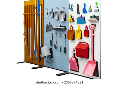 difference type home and garden tool hanging on board such as dustpan mob etc. isolated on white with clipping path