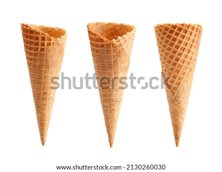 different angle of empty waffle ice cream cone isolated on white background