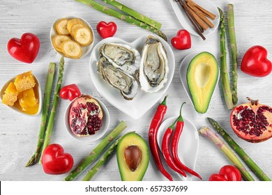 Different aphrodisiac food for increasing sexual desire on wooden table