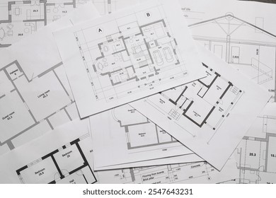 Different architectural drawings as background, top view