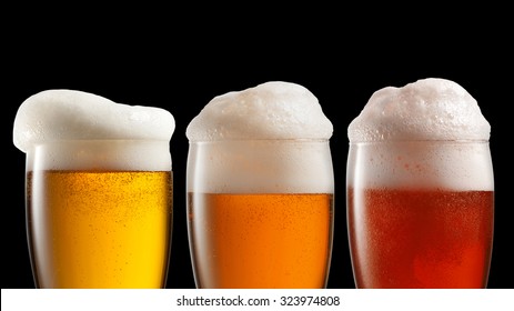 Different beer in glasses isolated on black background. Header for website - Powered by Shutterstock