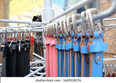 Different Belts Hang On A Clothes Rail