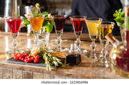 Different Bitters And Liqueurs In The Bar