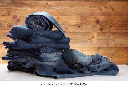 Lot of different blue jeans   