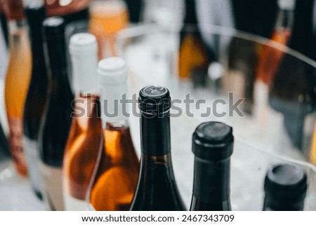 Different bottles of wine ready for wine tasting in a bar or restaurant or wine expo.