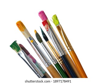 Different brushes and paints white background
