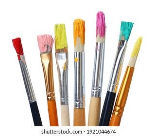 Different brushes and paints white background