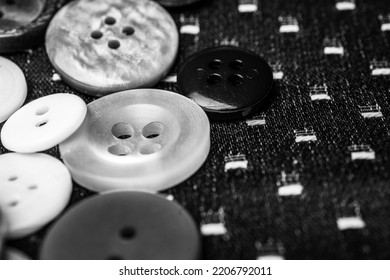 Different buttons on a background made of fabric