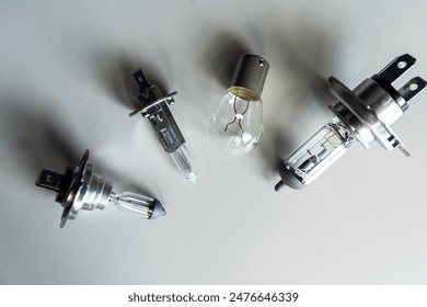 different car halogen headlight bulb H7 h1 h4 on white desk