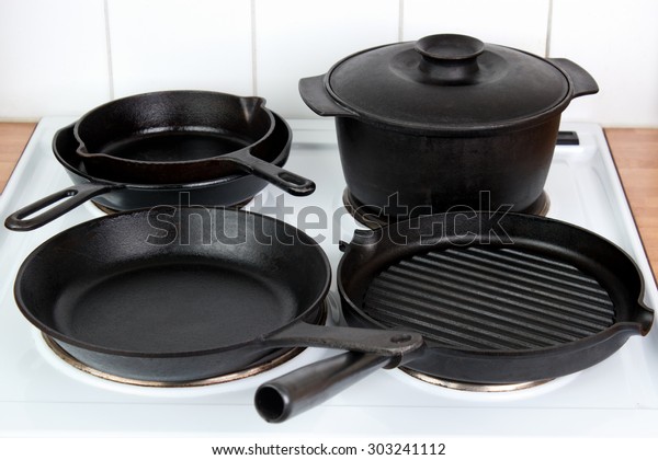 Different Cast Iron Cookware On Electric Objects Stock Image