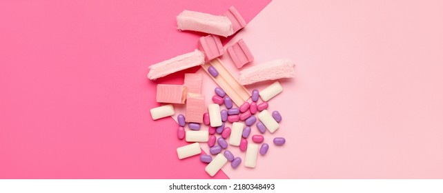 Different Chewing Gums On Pink Background