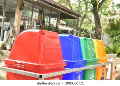 Different color bins outdoor. - Shutterstock ID 1080380771