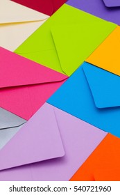 Different Colored Envelopes On The Table.