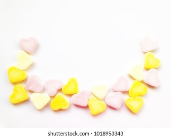 Different colored hearts placed on a white background. Multicolour hearts isolated on white background with copy space for Valentine’s Day